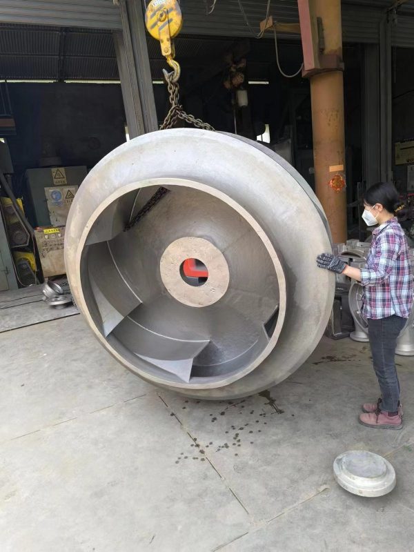 Closed impeller of about two tonnes in CD4MCu duplex stainless steel, viewed into the suction eye